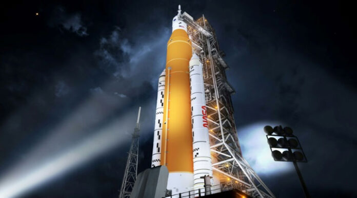 NASA's giant U.S. moon rocket emerges for debut launch