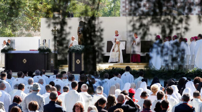 Popes who resign are humble, Francis says during a visit to central Italy